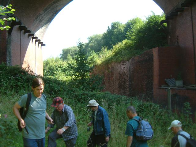 Emerging from under the arches